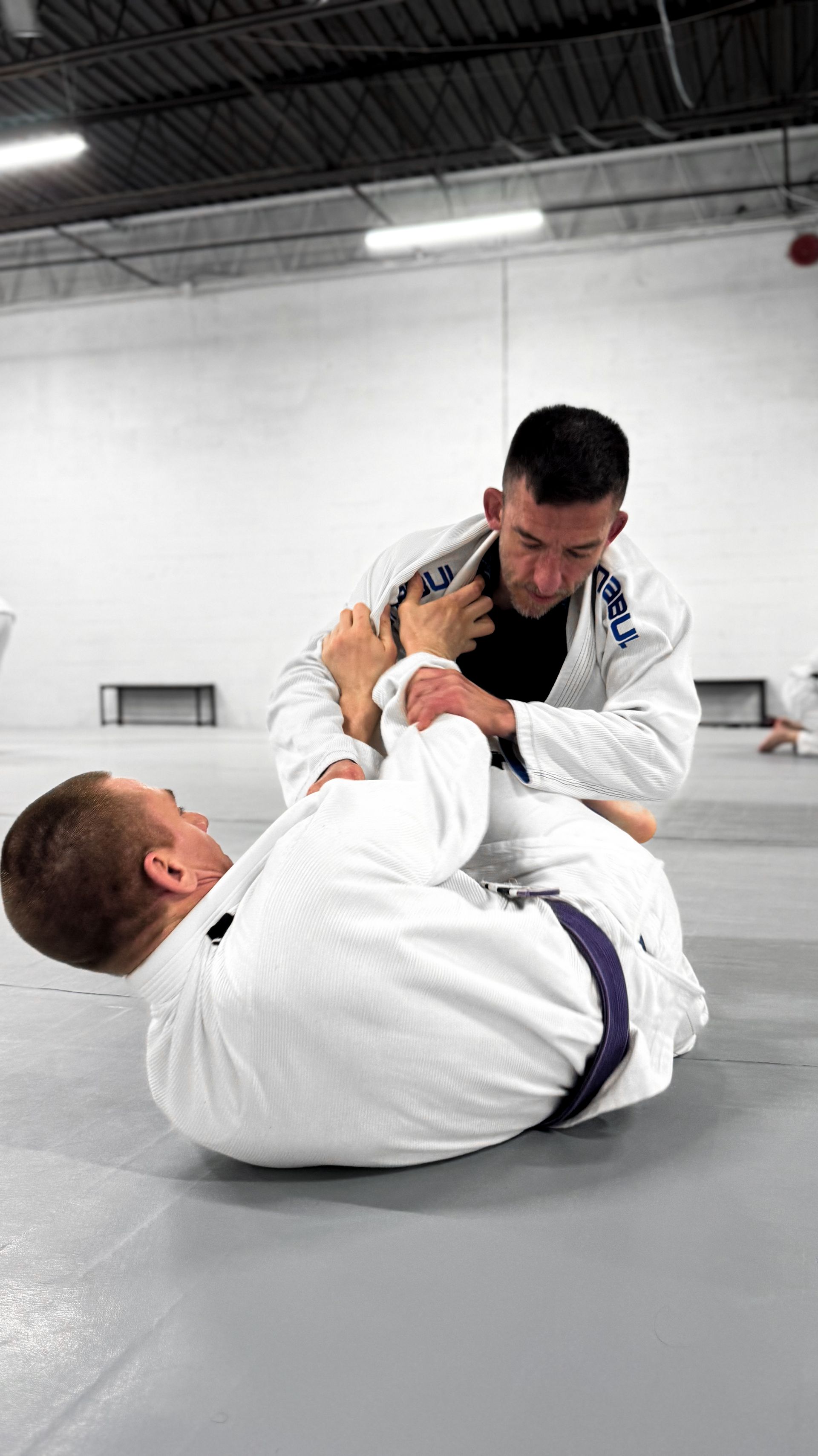 Students practice controlled grappling drills at Breathe Jiu Jitsu in Yaphank, NY.