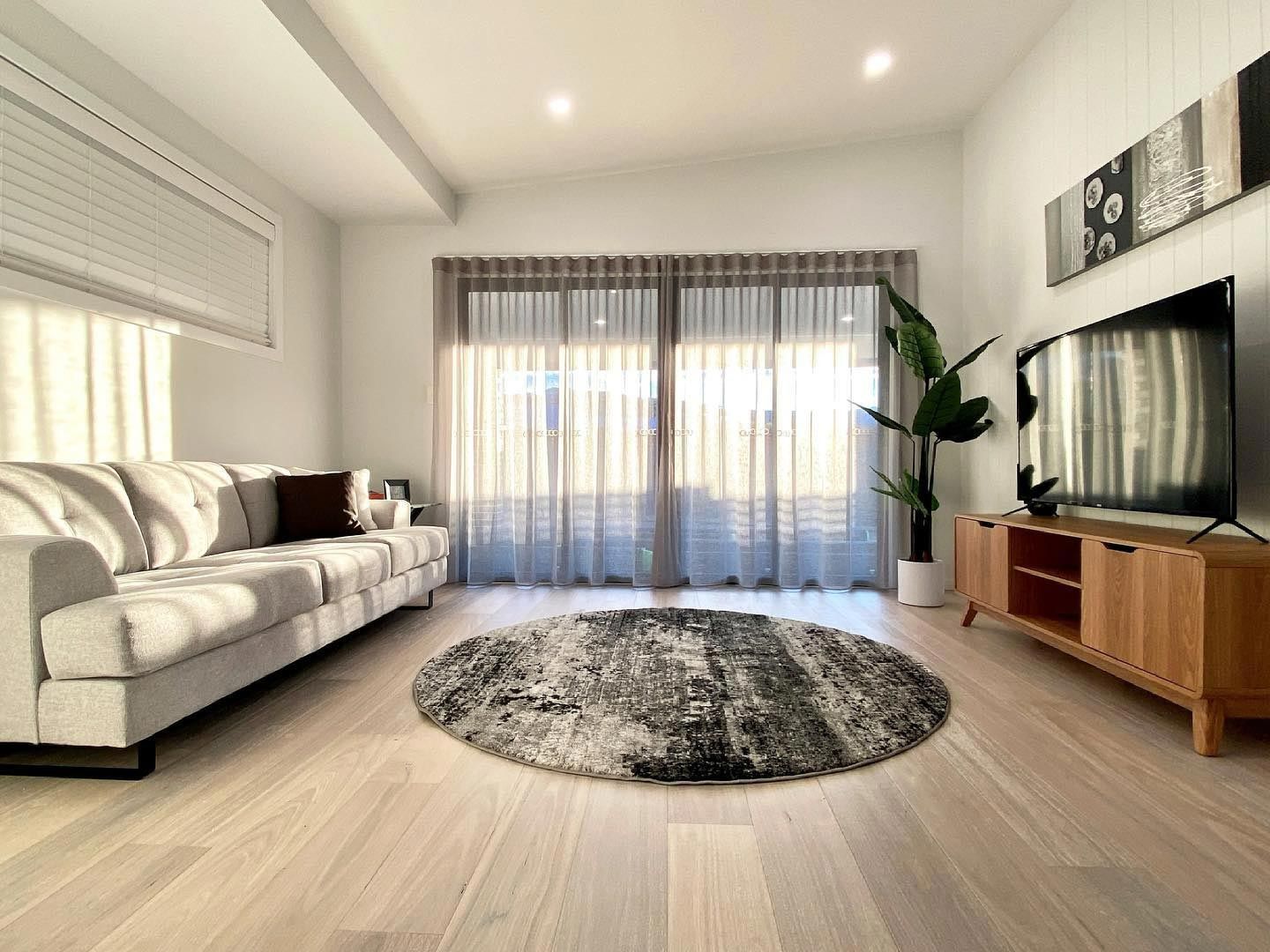 Living Room With Round Carpet
