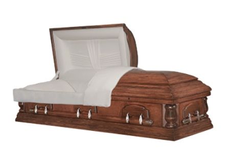 Opened wooden casket with white interior lining.