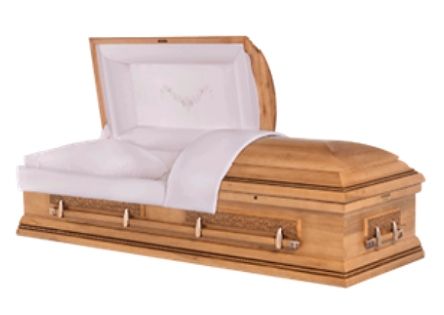 Open wooden casket with white interior, ready for a funeral.