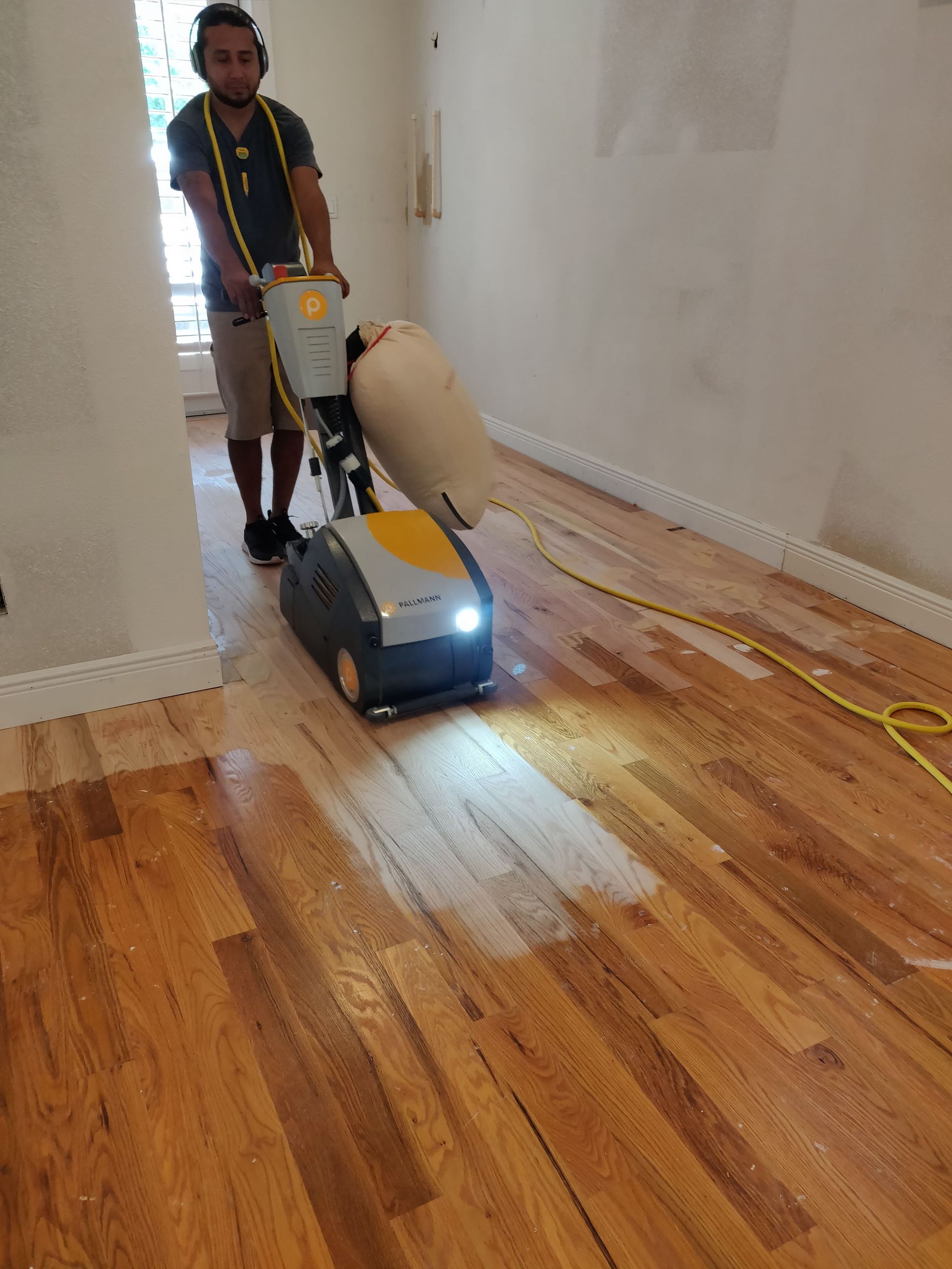 Sanding a wooden floor