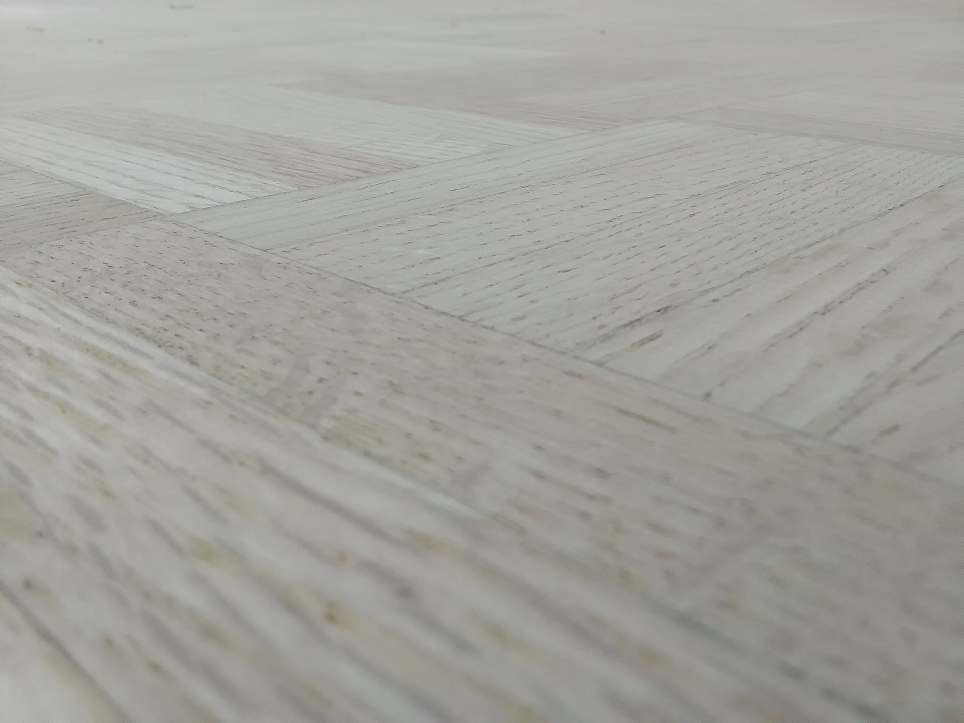 A close up of a piece of white wood