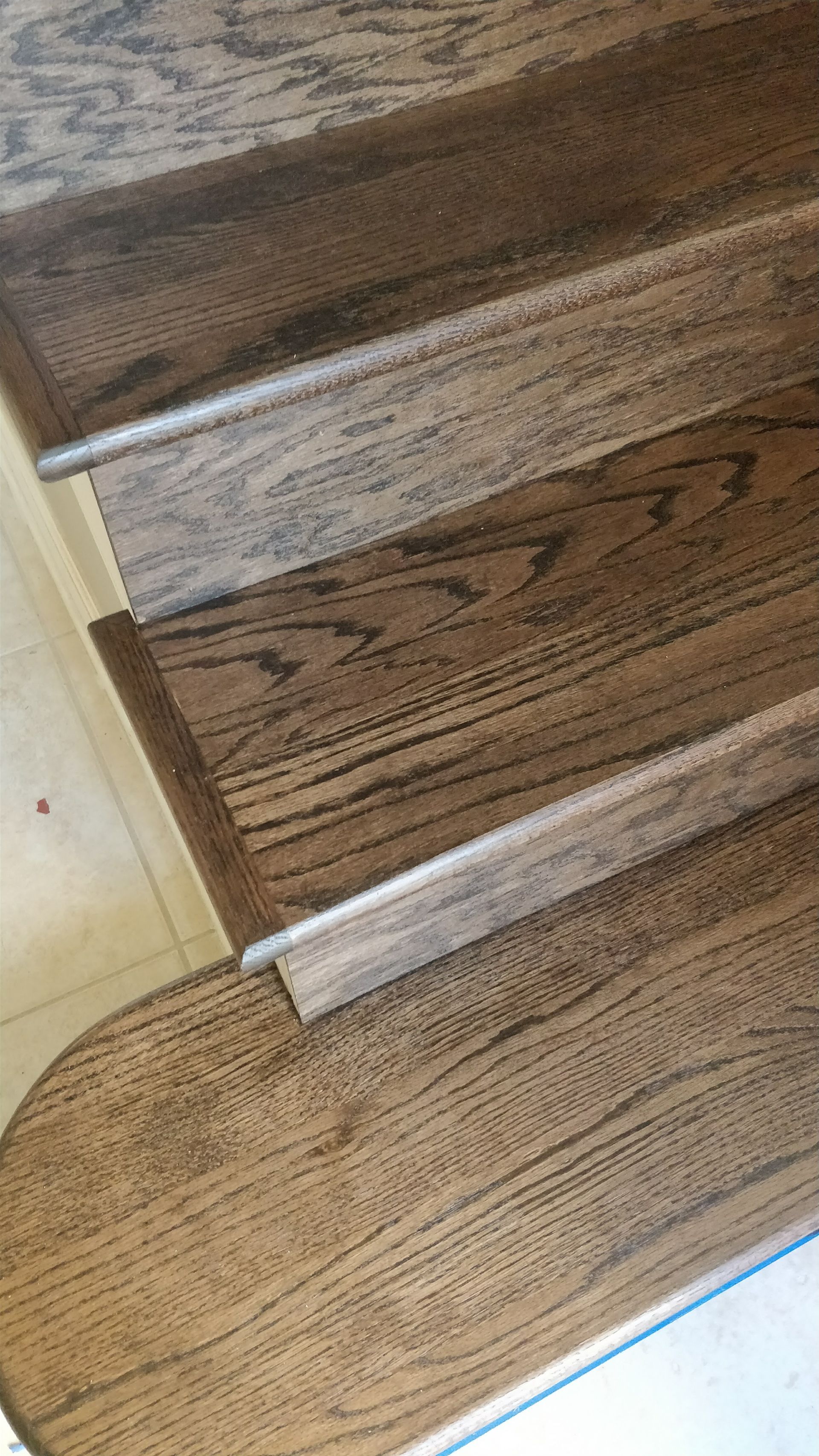 A close up of a set of wooden stairs