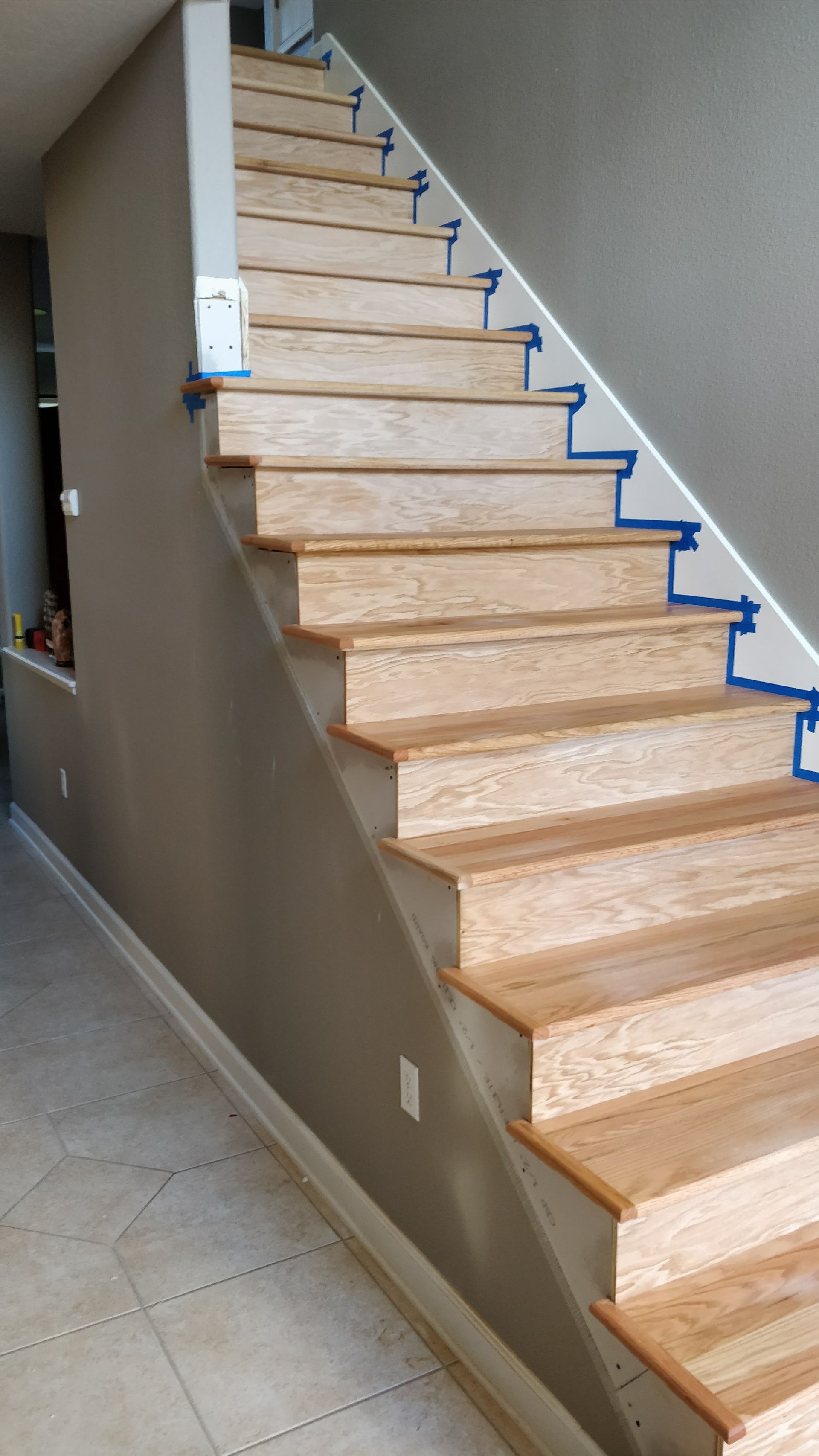 Wooden staircase is being painted 