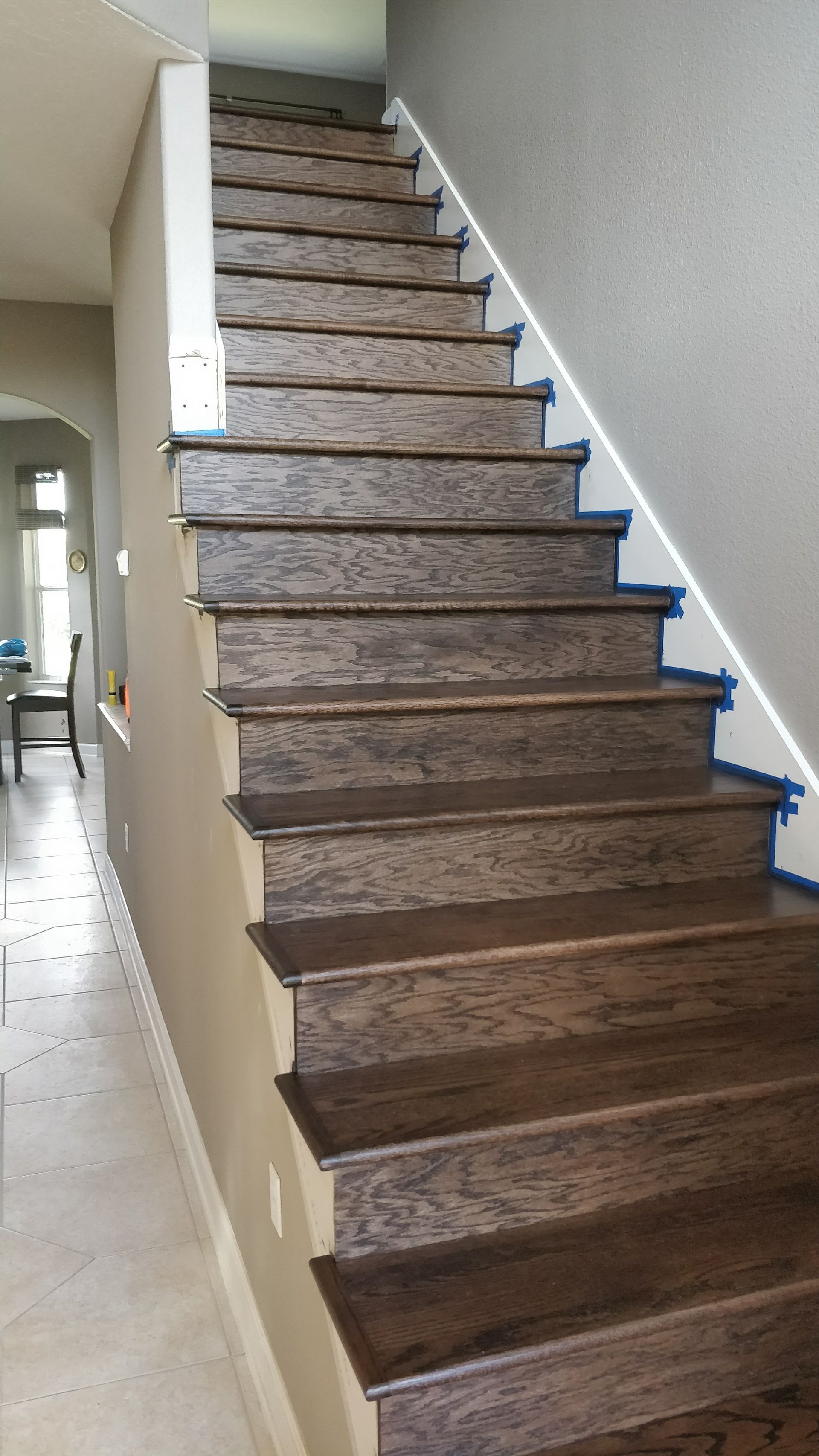 A set of stairs leading up to the second floor of a house
