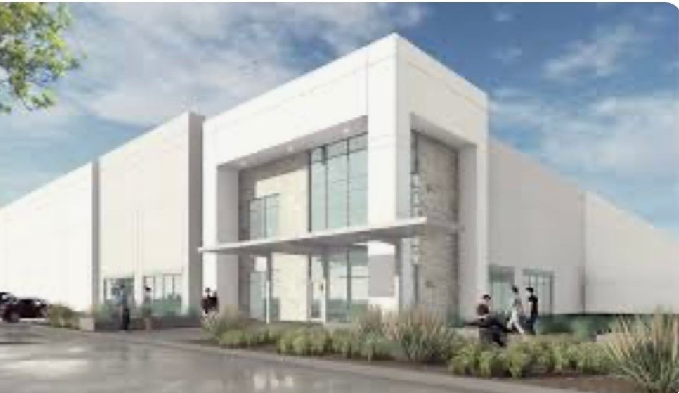 An artist 's impression of a large white building with a lot of windows.