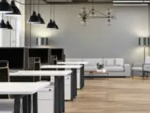 An empty office with tables , chairs , a couch and a chandelier.