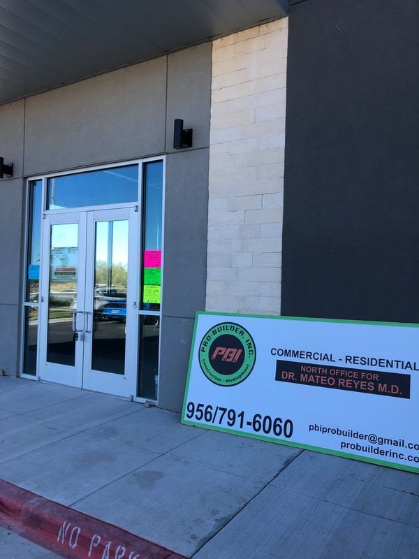 A building with a no parking sign in front of it