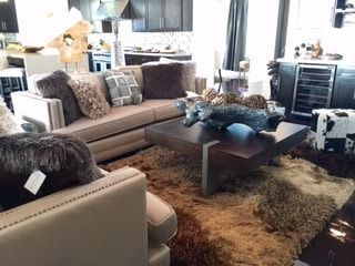 A living room with a couch and a coffee table