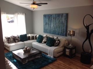 A living room with a couch and a coffee table