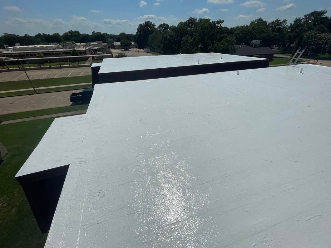 A white roof is sitting on top of a building.