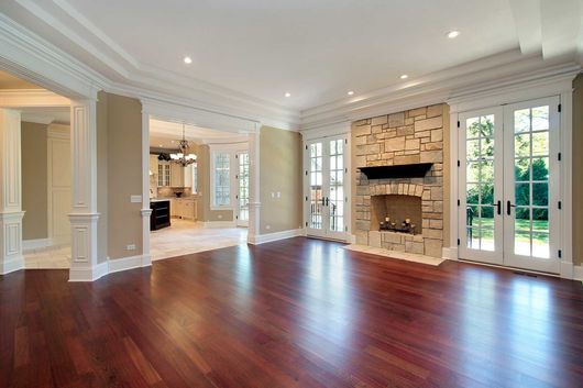 Living room with stone fireplace 
