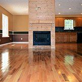 There is a fireplace in the middle of the room.