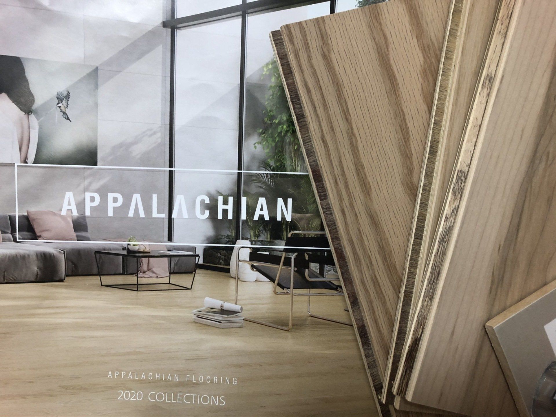 A living room with a couch and chairs and a sign that says appalachian