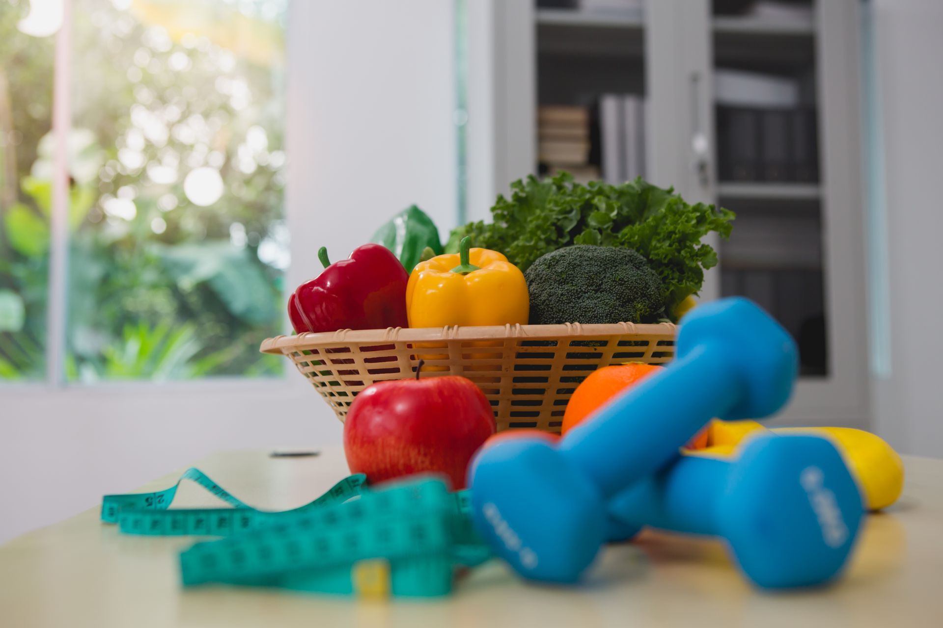 Healthy food and dumbells