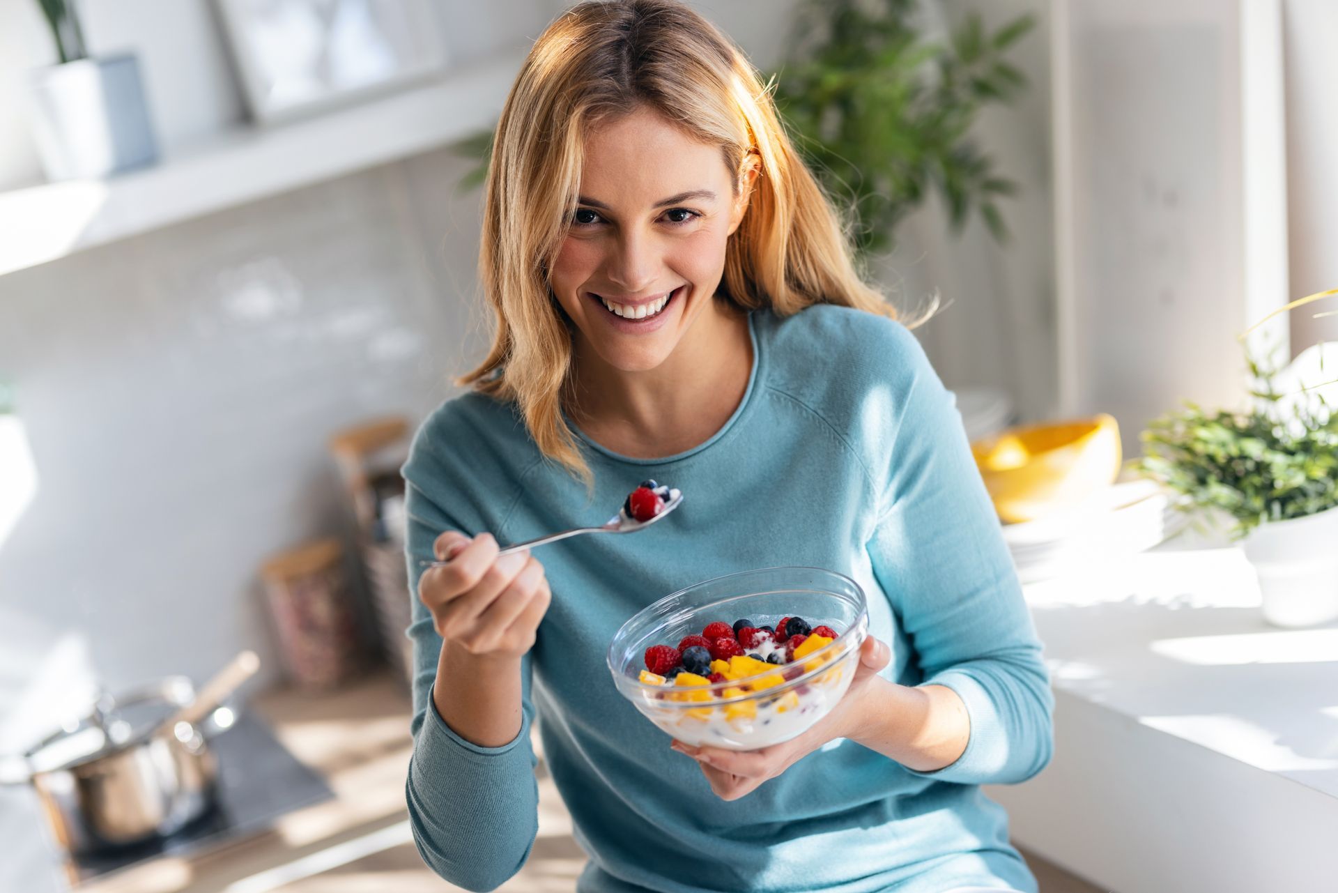 Woman eating happily