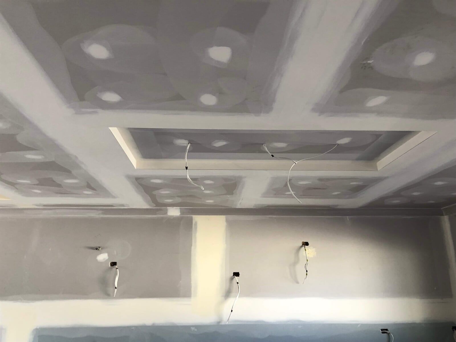 A Ceiling With a Lot of Holes in it is Being Built in a Room — Plaster Installation in Bensville, NSW