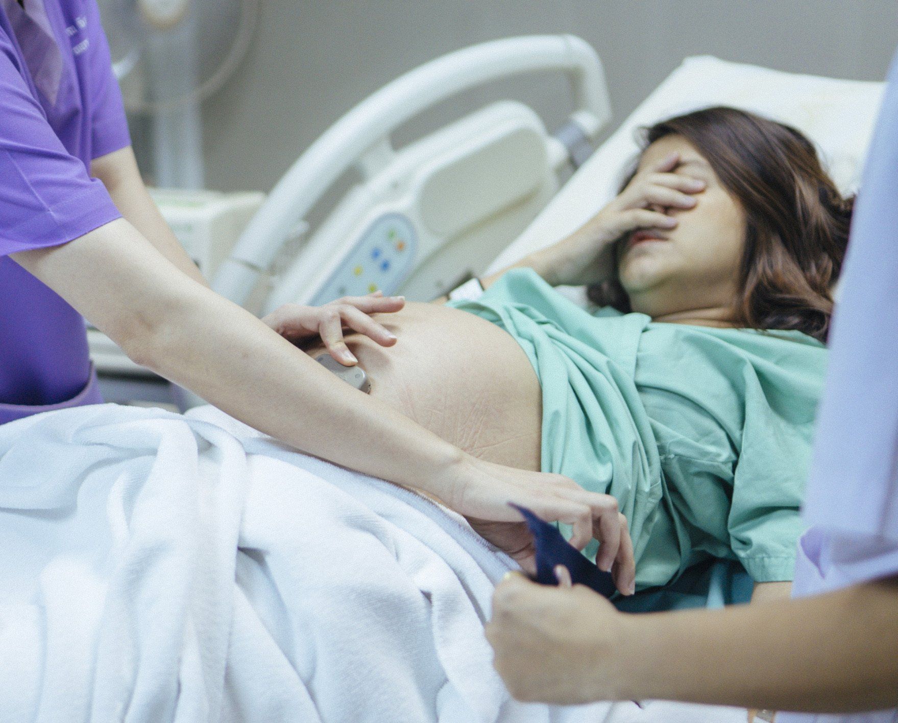 Doctor Examining a Pregnant Woman — Syracuse, NY — James B. Fleckenstein