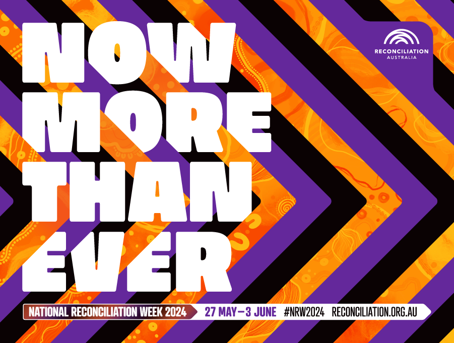 Two men are shaking hands in a close up of their hands.