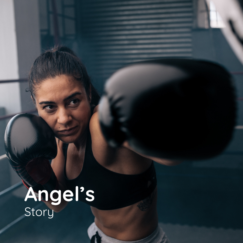 A woman wearing boxing gloves with the words angel 's story on the bottom