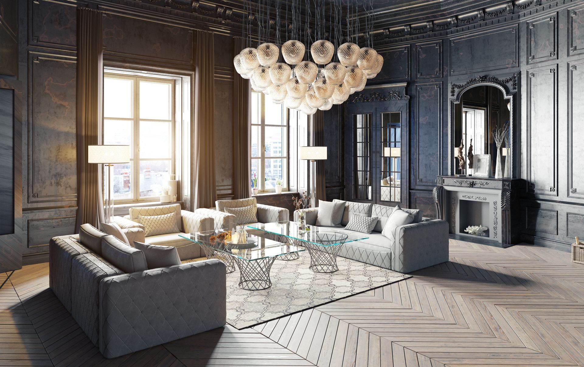 Luxurious living room with gray sofas, chandelier, fireplace, and large windows.