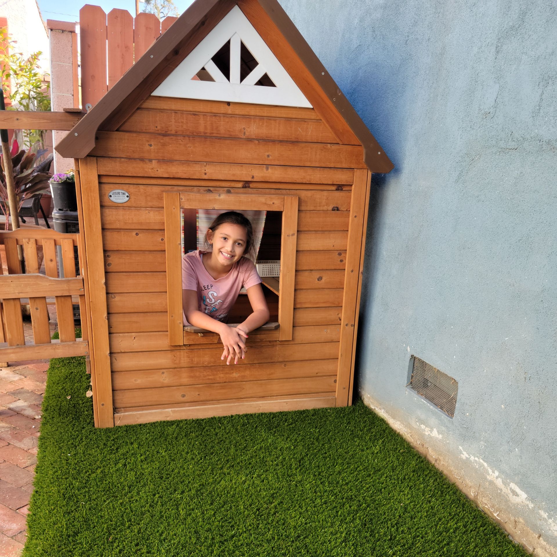 Playhouse on artificial grass in Whittier