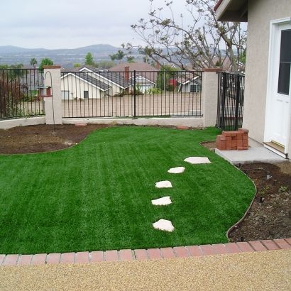 white stone path through grass