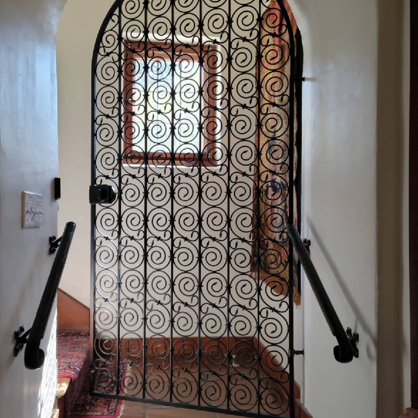 Custom wrought iron arched gate