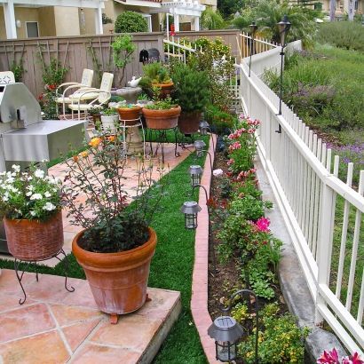 White fence and artificial grass