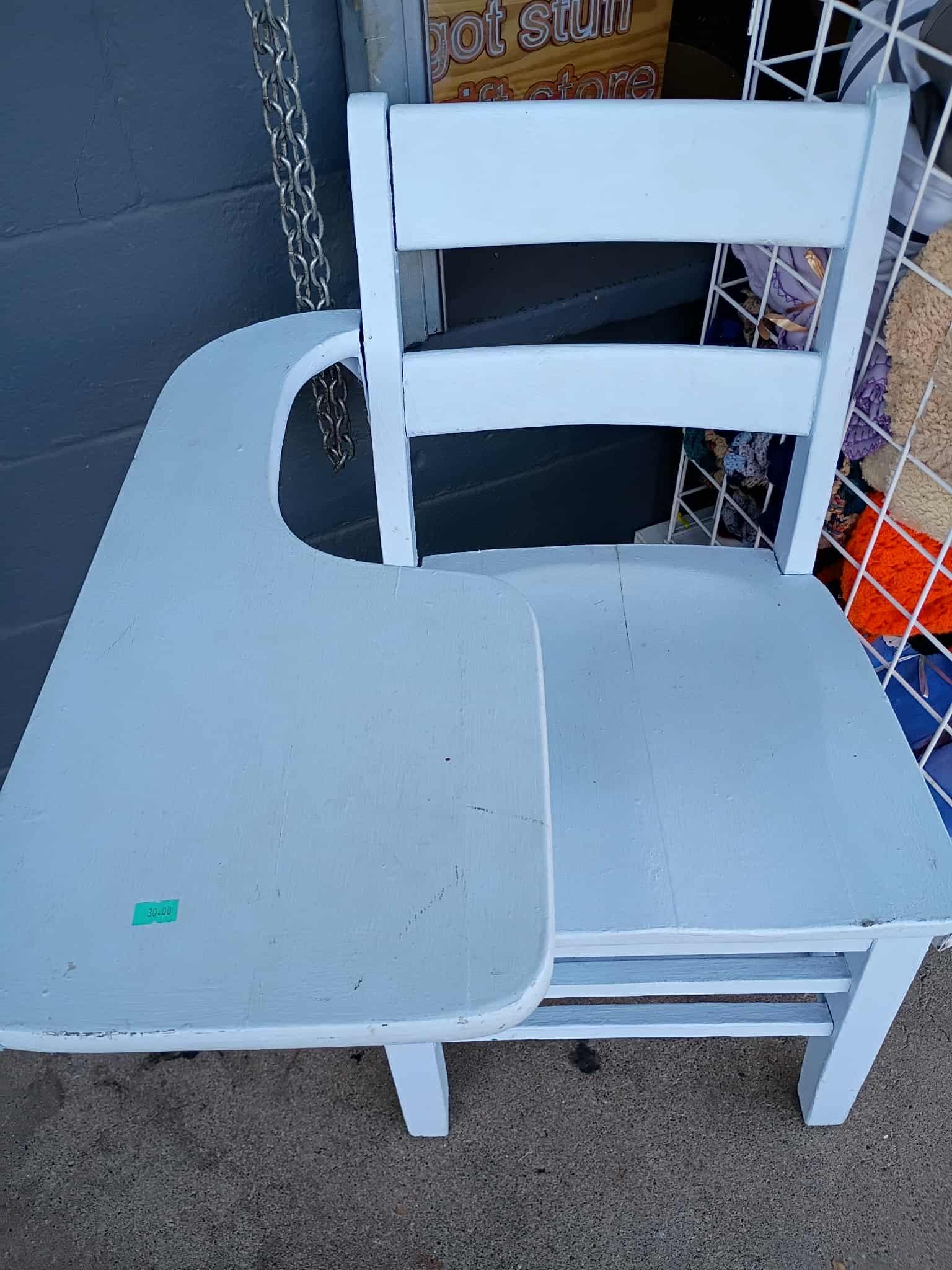 White vintage school desk and chair.