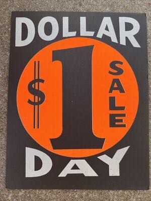 Dollar Day Sale sign: Orange circle with $1 and vertical SALE text, white text on black background.