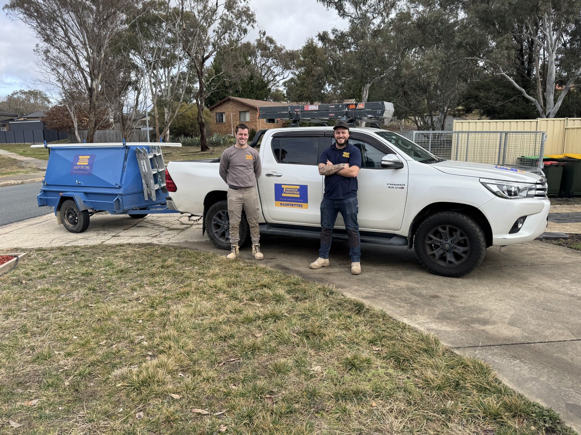 Ionitech Industries | Owner Standing Beside Their Business Vehicle | Canberra, ACT