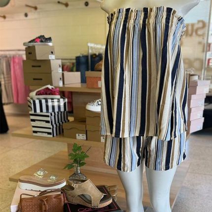 Mannequin wearing a striped top and shorts