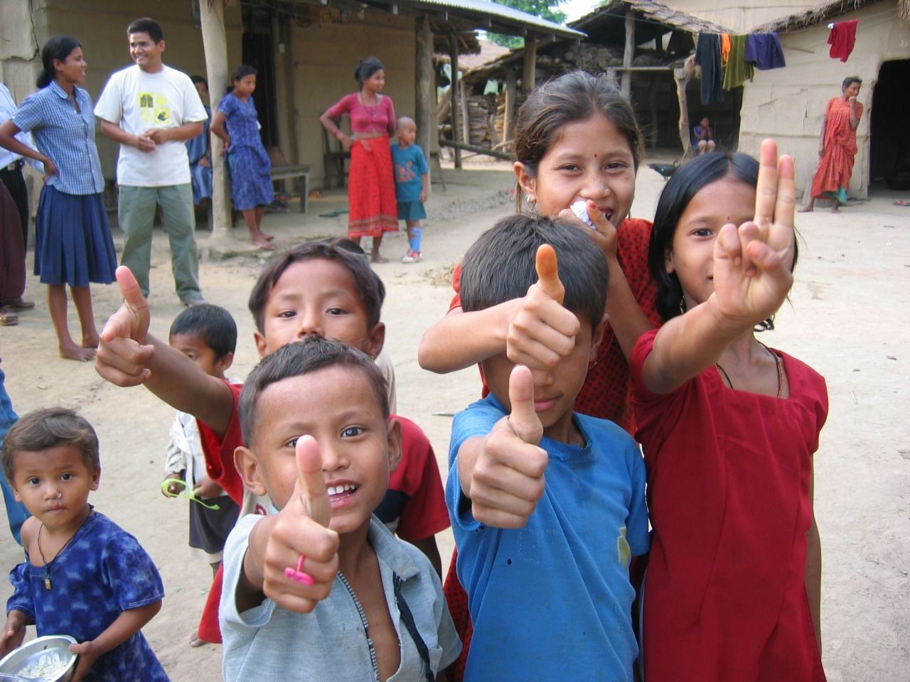 A bakery with a wooden floor and lots of display cases