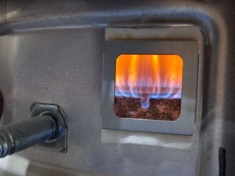 A burner firing in a heater