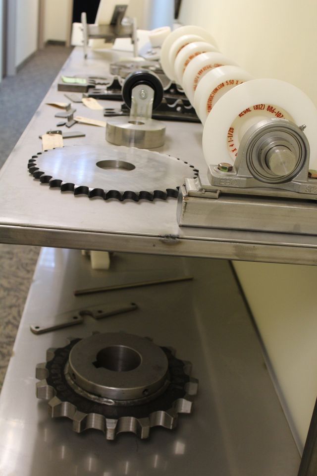 A table with a bunch of gears on it – USA - Regal Construction Inc.