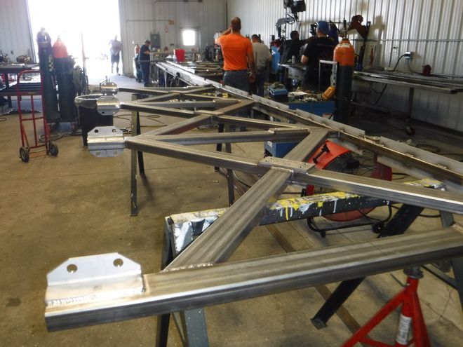 A large metal structure is being built in a factory – USA - Regal Construction Inc.