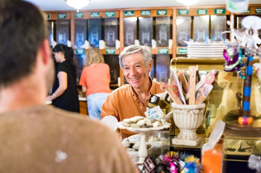 Owner chatting with customers