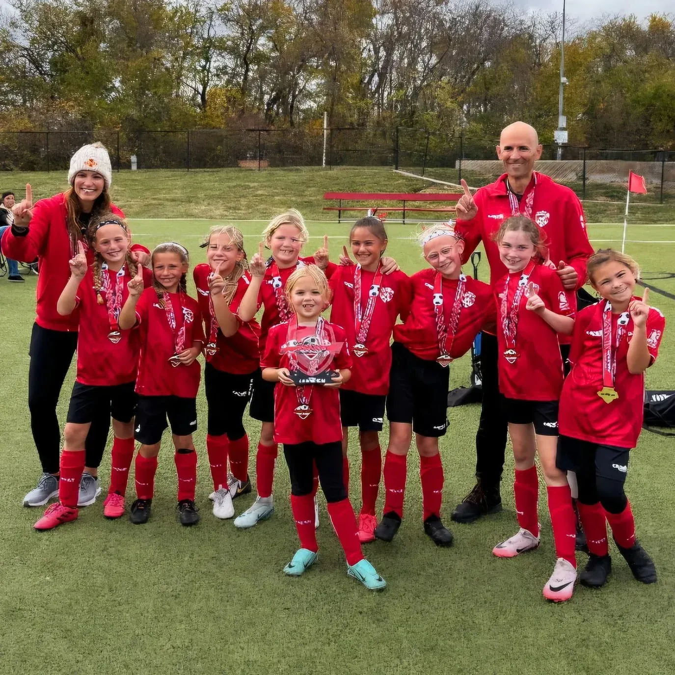 a soccer team huddled up
