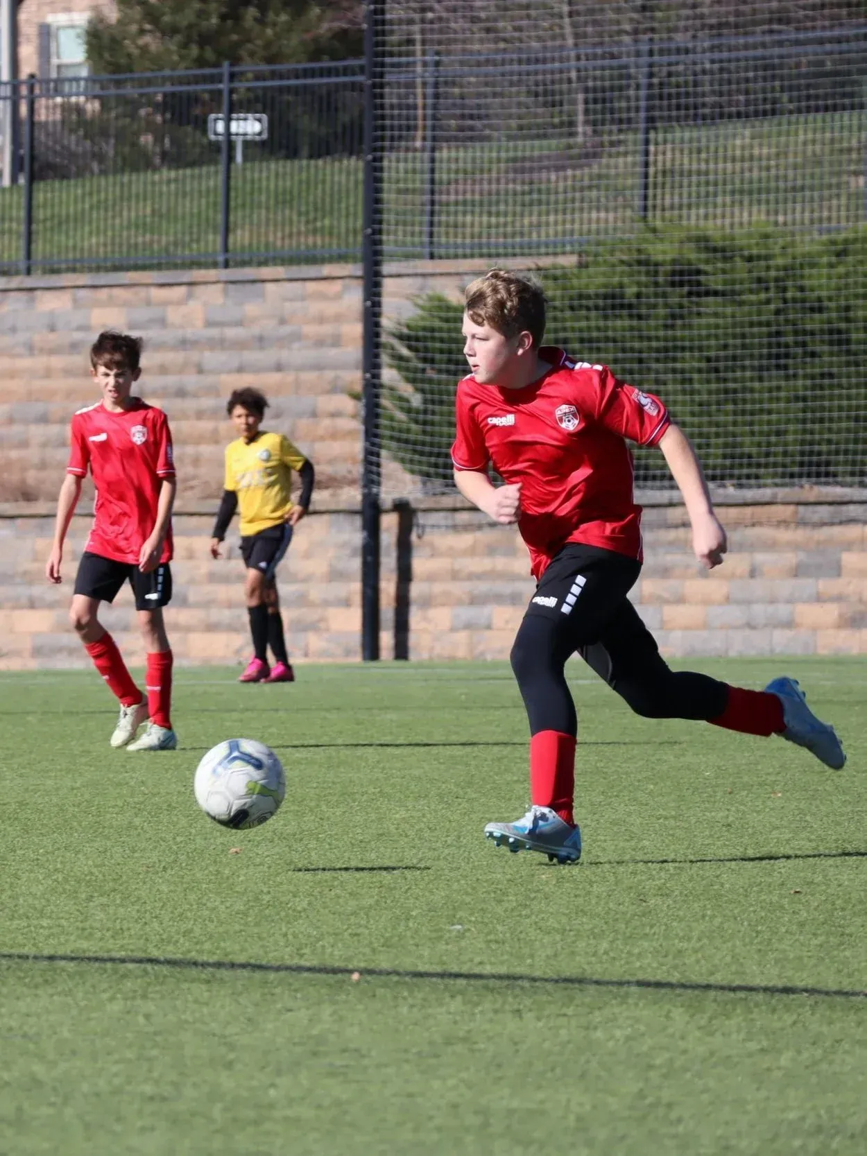a soccer team huddled up