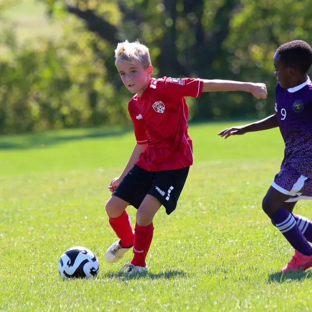 a soccer team huddled up