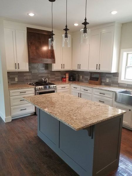 Kitchen with hardwood floor  — Custom Cabinets in Spring, AR