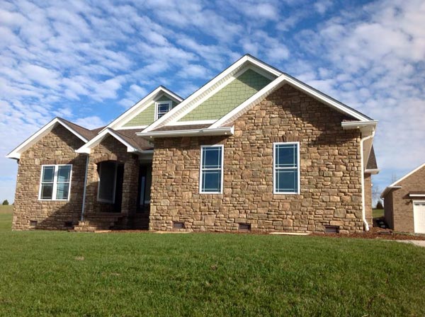 Gravel House with blue sky — Siding in Elizabethton, TN