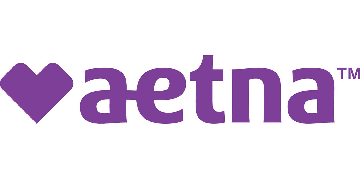 The aetna logo is purple with a heart in the middle.