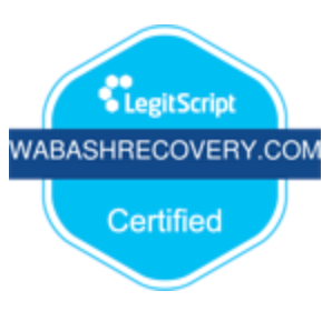 A blue sign that says legit script wabashrecovery.com certified