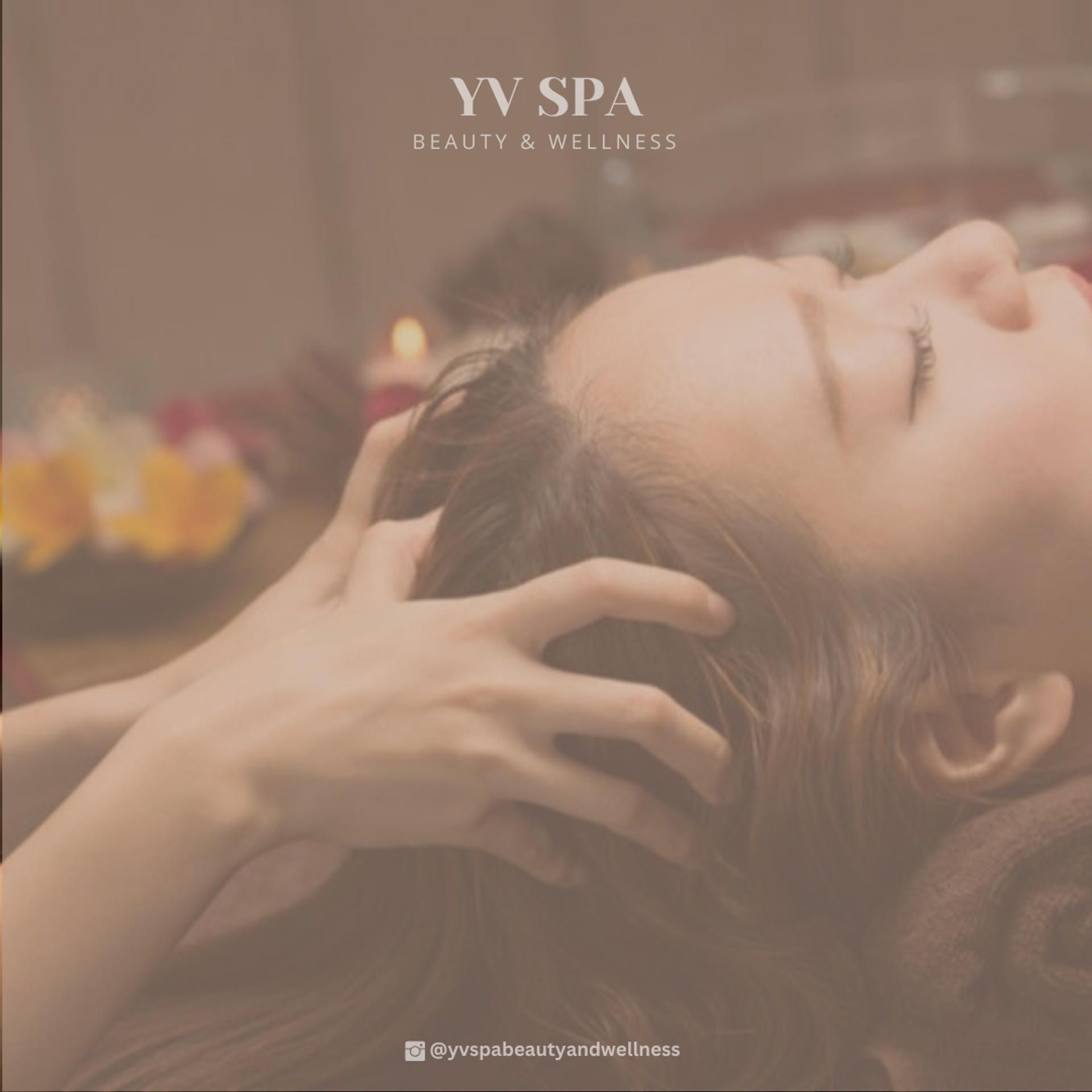 Person receiving a head massage at a spa. Hands on head, eyes closed. 