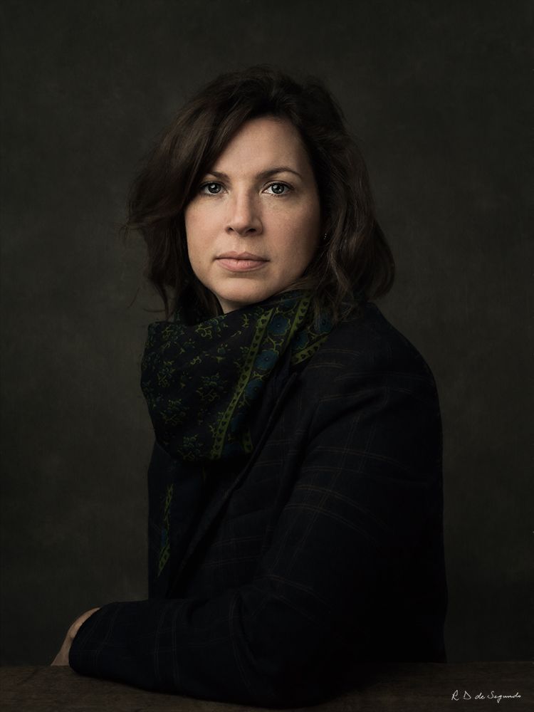 Studio fine art photo portrait of a woman using intricate lighting to emulate a soft media portrait from the Golden Age.