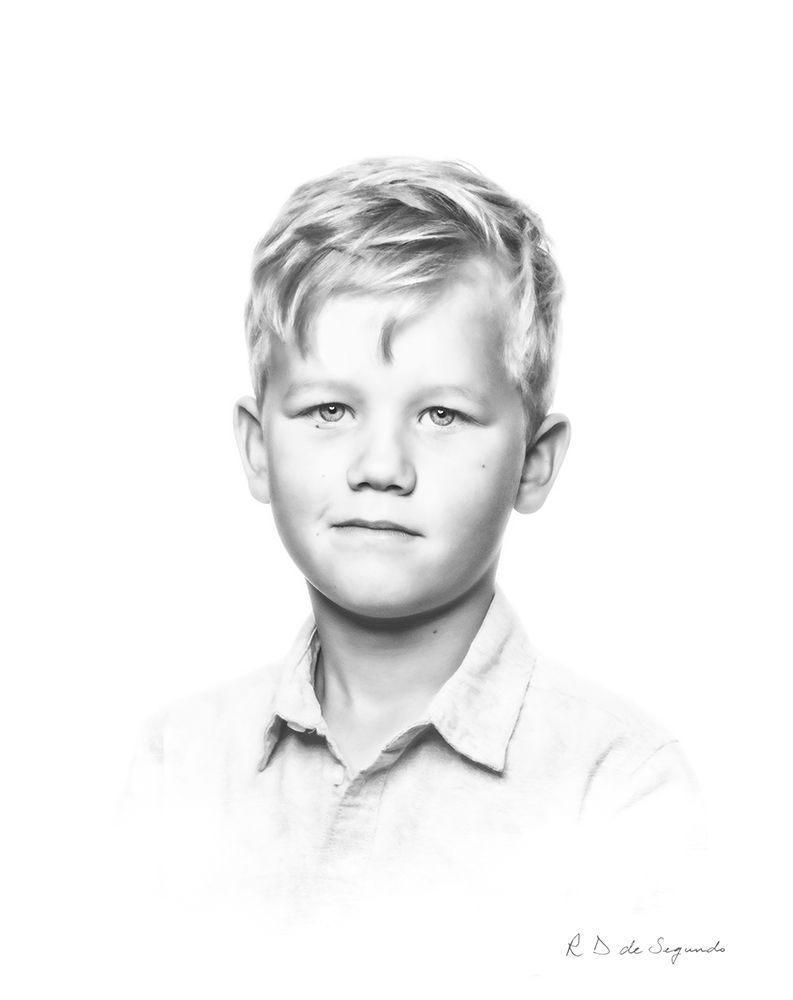 A signature photo portrait of a child that has been softened to give a charcoal like  styling.