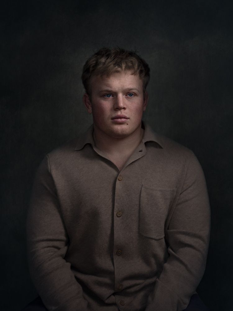 A portrait of a man looking thoughtful