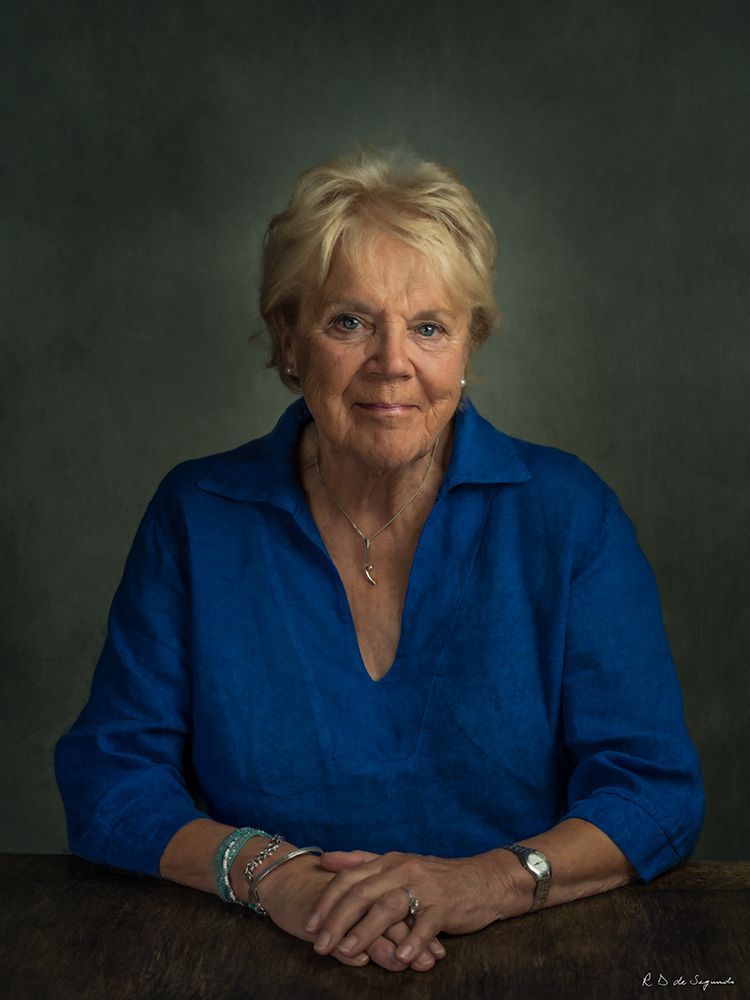 Studio fine art photo portrait of a woman using intricate lighting to emulate a soft media portrait from the Golden Age.